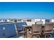 Enjoy the city views from the rooftop terrace with table, chairs, and lounge seating at 8175 Caldera Creek St, Las Vegas, NV 89113