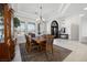 Formal dining area featuring an elegant chandelier and plenty of natural light at 8290 Gagnier Blvd, Las Vegas, NV 89113