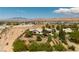A serene single-story home is surrounded by a beautifully landscaped desert yard, mountains and community views at 8290 Gagnier Blvd, Las Vegas, NV 89113