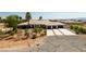 Stunning single-story home boasts mature landscaping, a three-car garage, and a spacious driveway at 8290 Gagnier Blvd, Las Vegas, NV 89113