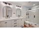 Beautiful bathroom features double sinks, modern fixtures, and a glass-enclosed shower at 8813 Sundial Dr, Las Vegas, NV 89134