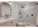 Modern bathroom with a walk-in shower, and a bright, stylish vanity at 8813 Sundial Dr, Las Vegas, NV 89134