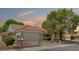 Charming single-story home featuring a tile roof, well-manicured landscaping, and a spacious two-car garage at 8813 Sundial Dr, Las Vegas, NV 89134