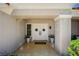 Welcoming entrance features double doors, a desert-themed garden, and a charming welcome mat at 8813 Sundial Dr, Las Vegas, NV 89134