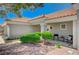 Charming front porch features desert landscaping and comfortable seating for relaxing outdoors at 8813 Sundial Dr, Las Vegas, NV 89134