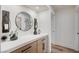 Hallway features wood-look floors, stylish decor, and a modern console table at 8813 Sundial Dr, Las Vegas, NV 89134