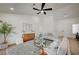 Open living room featuring vaulted ceilings, modern decor, and wood-look flooring at 8813 Sundial Dr, Las Vegas, NV 89134