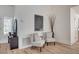 Cozy sitting area with comfortable chairs, wood-look floors and natural light at 8813 Sundial Dr, Las Vegas, NV 89134