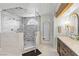Elegant bathroom featuring a frameless shower, double vanities, and refined design at 8820 Fall Green Ave, Las Vegas, NV 89129