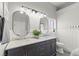 Bathroom with double sinks, vanity and large mirrors at 8820 Fall Green Ave, Las Vegas, NV 89129