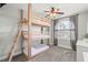 Bright bedroom with a unique bunk bed and carpet flooring at 8820 Fall Green Ave, Las Vegas, NV 89129