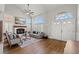 Elegant living room featuring vaulted ceilings, hardwood floors, and natural light at 8820 Fall Green Ave, Las Vegas, NV 89129