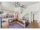 Open-concept living area with high ceilings, a fireplace, and seamless access to the kitchen at 8820 Fall Green Ave, Las Vegas, NV 89129