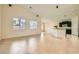 Open living space with tile flooring, large windows, and ample natural light at 9252 Oxbow Lake Ave, Las Vegas, NV 89149