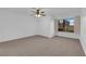 Bright, carpeted primary bedroom with double closet and plantation shutters at 9424 Gold Mountain Dr, Las Vegas, NV 89134