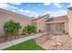 Charming one-story home features an attractive front entrance, desert landscaping, and a walkway at 9424 Gold Mountain Dr, Las Vegas, NV 89134
