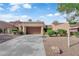 Charming one-story home features an attached garage, desert landscaping, and a well-maintained exterior at 9424 Gold Mountain Dr, Las Vegas, NV 89134