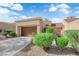 Charming one-story home features an attached garage, desert landscaping, and a well-maintained exterior at 9424 Gold Mountain Dr, Las Vegas, NV 89134