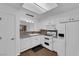 Clean kitchen features white appliances and lots of counter space at 9424 Gold Mountain Dr, Las Vegas, NV 89134