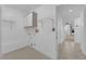 A laundry room featuring built in cabinets, shelving, and connections for the washing machine at 9424 Gold Mountain Dr, Las Vegas, NV 89134