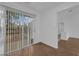 Enclosed patio area with sliding glass doors and backyard views at 9424 Gold Mountain Dr, Las Vegas, NV 89134