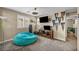 Comfortable bedroom with a stylish ceiling fan and a plush beanbag chair at 10312 Glimmering Star Dr, Las Vegas, NV 89178