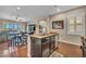 Spacious kitchen with stainless steel appliances, breakfast bar and dining area at 10312 Glimmering Star Dr, Las Vegas, NV 89178