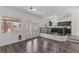 View of the pool through the doors of the living area at 11484 Roncat Ct, Las Vegas, NV 89141