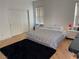 Cozy bedroom with wood floors, a large bed, and a closet at 1525 Spiced Wine Ave # 14101, Henderson, NV 89074
