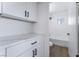Bathroom featuring a shower, toilet, cabinets, and drawers with modern hardware, and a quartz countertop at 2 Utah Way, Henderson, NV 89015