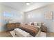 Inviting main bedroom featuring neutral tones, ample natural light, and contemporary furnishings at 2 Utah Way, Henderson, NV 89015