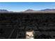 Community aerial view of a residential neighborhood in a desert landscape with mountain views at 218 Red Coral Dr, Henderson, NV 89002