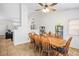 Cozy dining area with wood table and chairs, next to an open-concept living area at 218 Red Coral Dr, Henderson, NV 89002