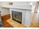 Classic fireplace with tile surround and hearth, perfect for cozy evenings at home at 218 Red Coral Dr, Henderson, NV 89002
