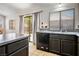 Beautiful kitchen area with stainless steel appliances and sliding door to outside at 218 Red Coral Dr, Henderson, NV 89002
