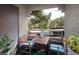 Cozy balcony with chairs, table, potted plants and a view of the parking area at 2200 S Fort Apache Rd # 2217, Las Vegas, NV 89117