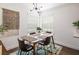 Cozy dining room with contemporary table and chairs, accented by a colorful rug and bright natural light at 2200 S Fort Apache Rd # 2217, Las Vegas, NV 89117