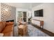 Modern living room showcasing stylish furniture, a fireplace, and a sliding door for indoor-outdoor living at 2200 S Fort Apache Rd # 2217, Las Vegas, NV 89117