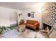 Living room boasts a decorative fireplace, comfortable seating, and unique design elements for a welcoming atmosphere at 2200 S Fort Apache Rd # 2217, Las Vegas, NV 89117