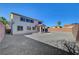 Spacious backyard featuring a covered patio and block wall fencing, with potential for landscaping at 2261 Dalton Ridge Ct, North Las Vegas, NV 89031