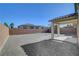 Backyard featuring desert landscaping and a covered patio area at 2261 Dalton Ridge Ct, North Las Vegas, NV 89031