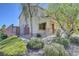 View of the side of a home with well-maintained landscaping and a privacy fence at 2261 Dalton Ridge Ct, North Las Vegas, NV 89031