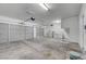 Spacious garage with multiple garage doors, washer, and dryer at 2261 Dalton Ridge Ct, North Las Vegas, NV 89031