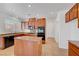 Kitchen showcasing granite countertops, central island, and stainless steel appliances at 2261 Dalton Ridge Ct, North Las Vegas, NV 89031