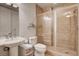 Bathroom with a tiled shower, a modern sink, and a toilet at 2405 W Serene Ave # 612, Las Vegas, NV 89123
