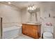 Bathroom featuring a vanity, and tiled bathtub, providing a serene and practical space at 2405 W Serene Ave # 612, Las Vegas, NV 89123