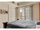 Comfortable bedroom with ample closet space and a balcony overlooking the property at 2405 W Serene Ave # 612, Las Vegas, NV 89123