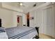 Well-lit bedroom features a closet, and access to the bathroom, ideal for comfort and privacy at 2405 W Serene Ave # 612, Las Vegas, NV 89123