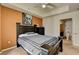 Cozy bedroom with a large window, ceiling fan and access to the attached bathroom at 2405 W Serene Ave # 612, Las Vegas, NV 89123