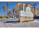 Elegant entrance to Boca Raton Condominiums featuring manicured landscaping and prominent signage at 2405 W Serene Ave # 612, Las Vegas, NV 89123